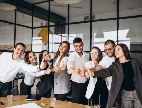 Group of people working out business plan in an office